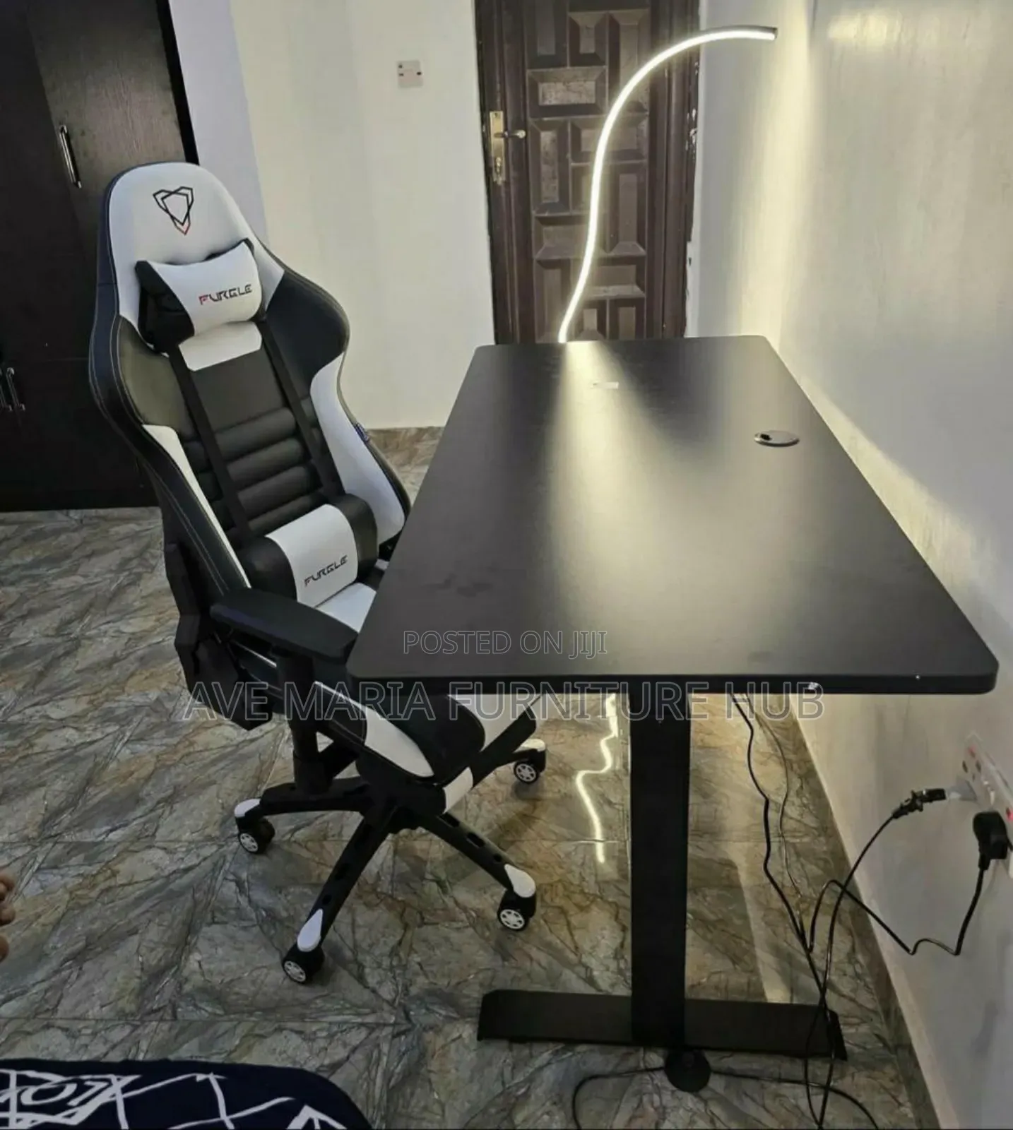 Electric Adjustable Height Desk and Gaming Chair.