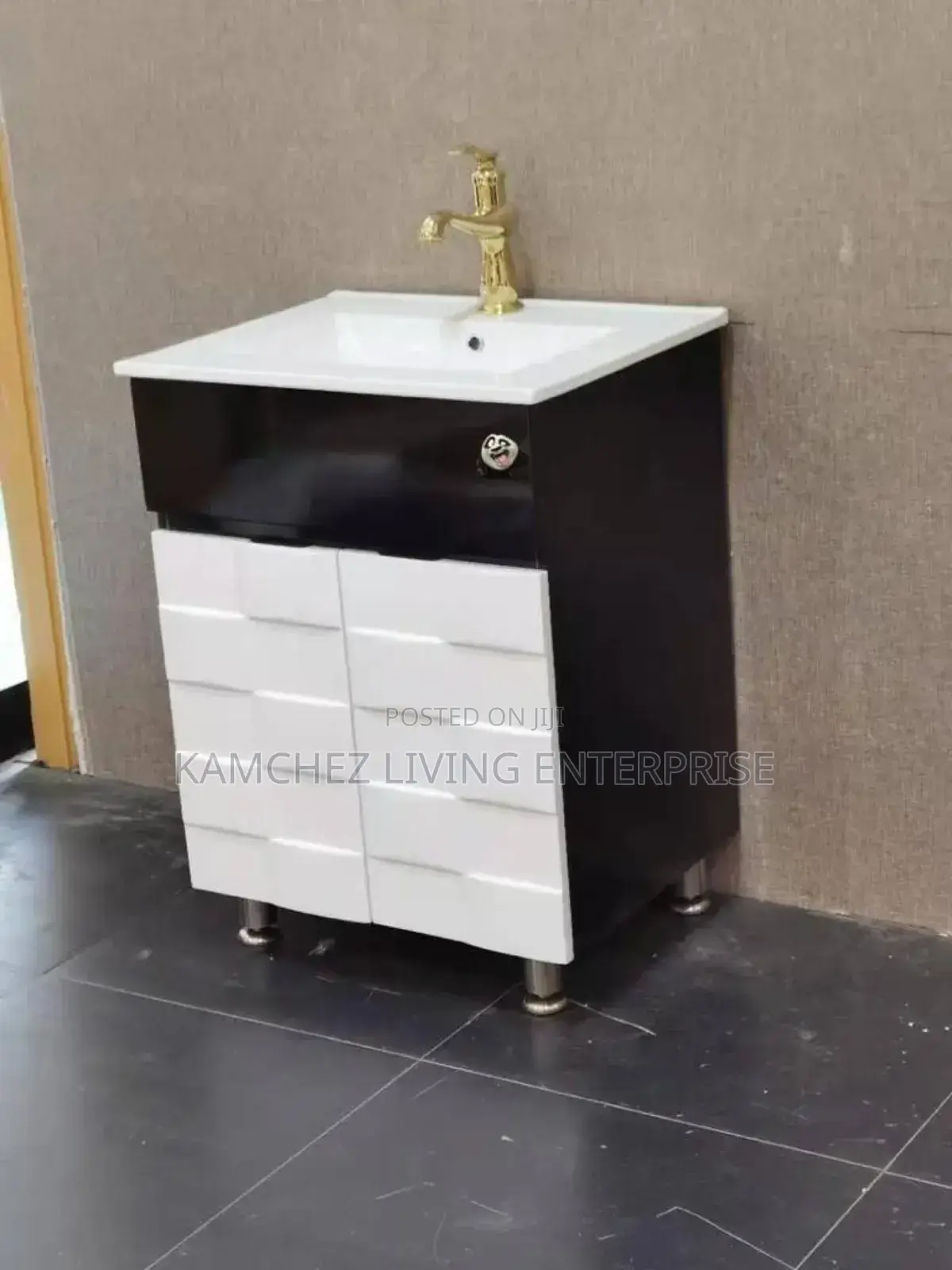 Modern Black and White Sink Vanity With Gold Faucet