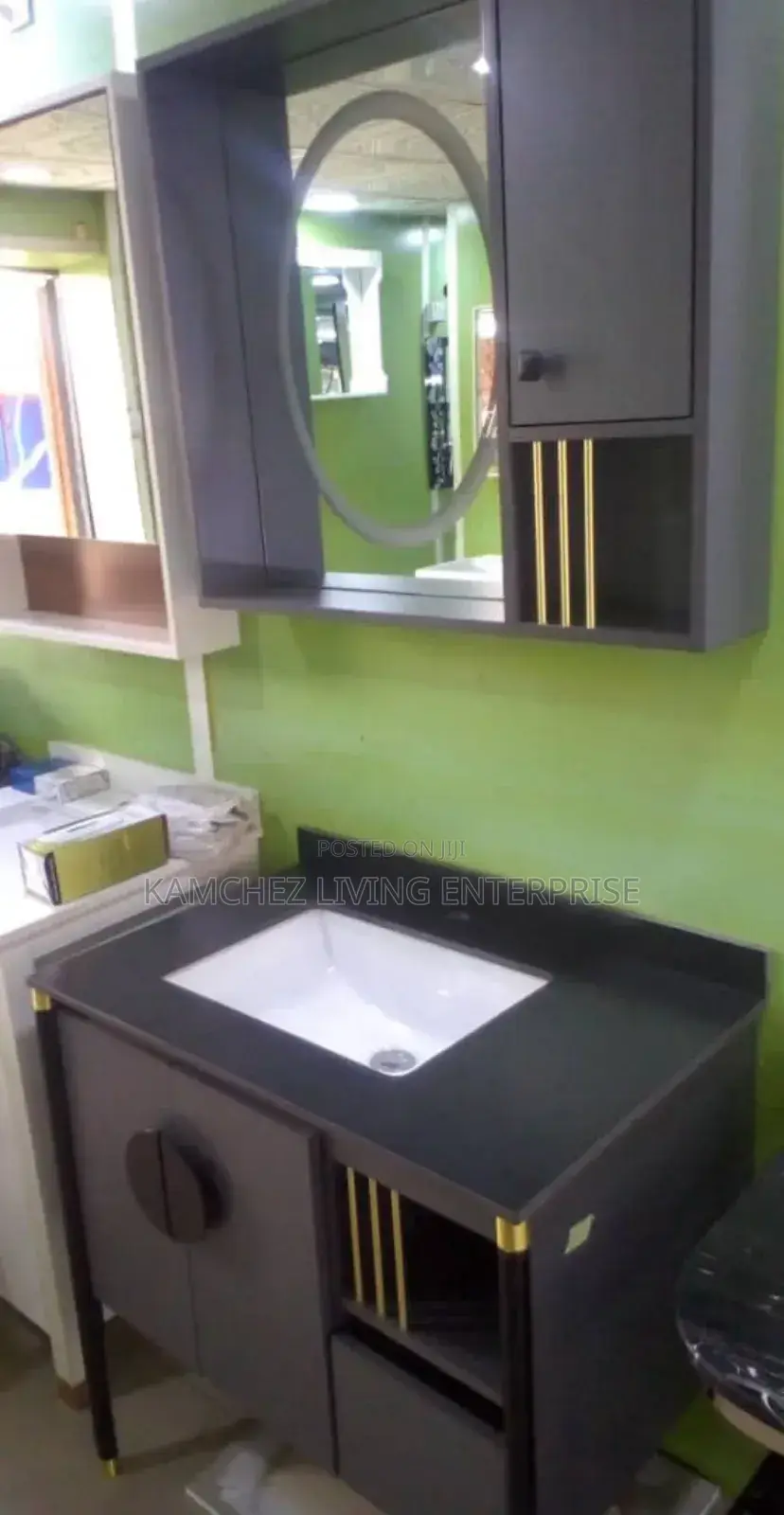 Modern Black Sink Vanity With Oval Mirror and Storage