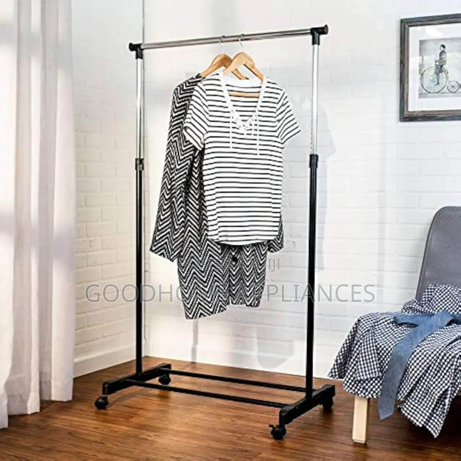 Movable Single Pole Clothes Hanger With Wheels