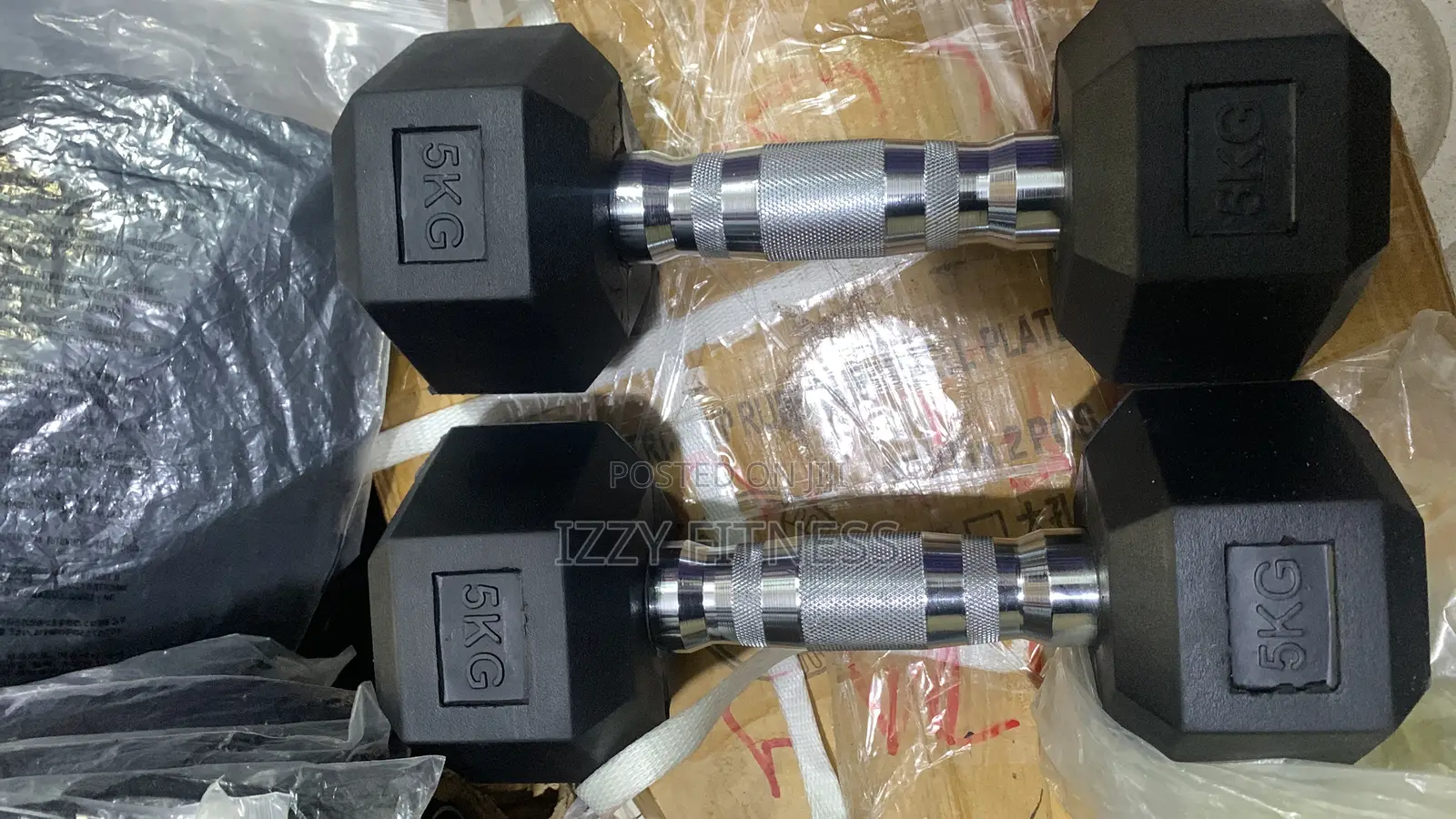 A Pair Of 5kg Dumbbell