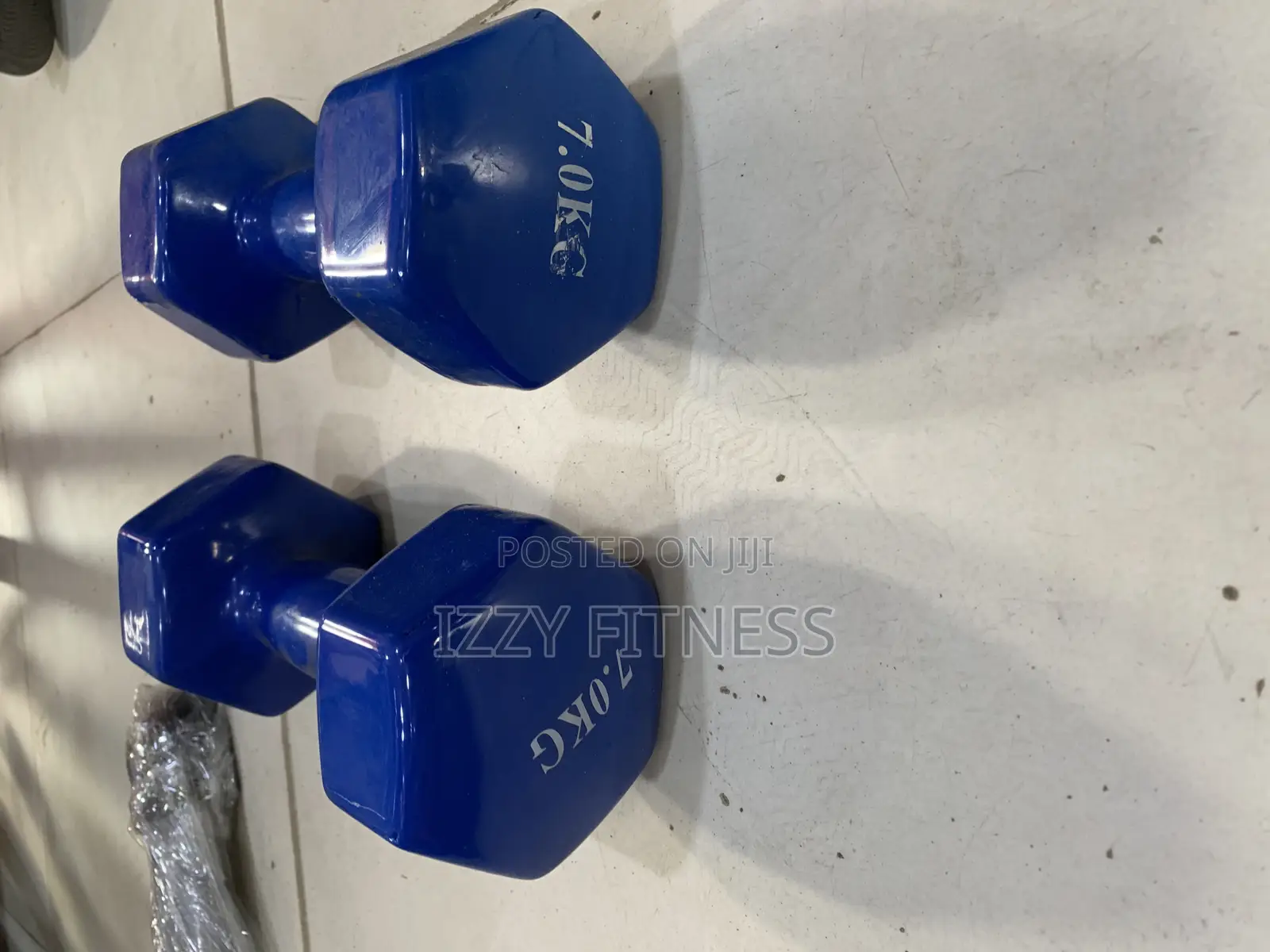 A Pair Of 7kg Dumbbells