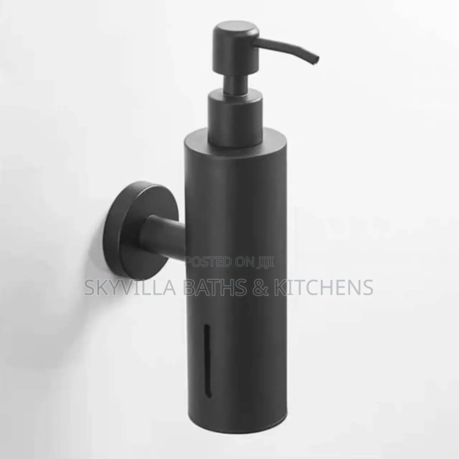 Black Wall Hung Liquid Soap Dispenser.