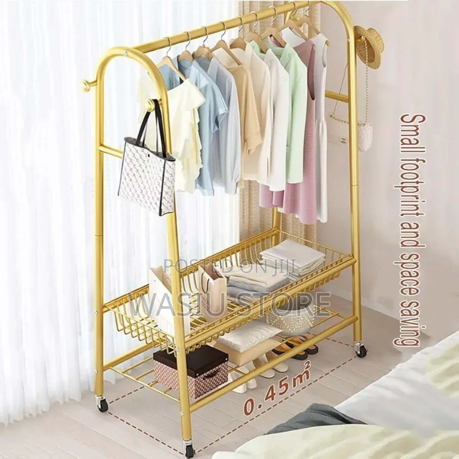 Golden Freestanding Clothes Rack With Wheels