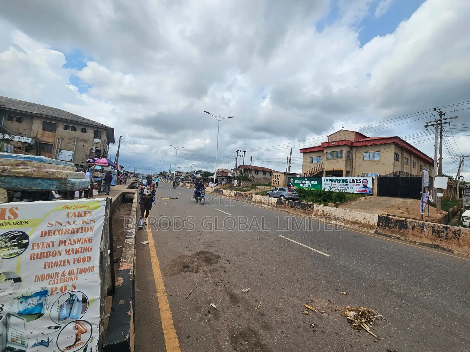 Commercial Land With Existing Building on Adigbe Road