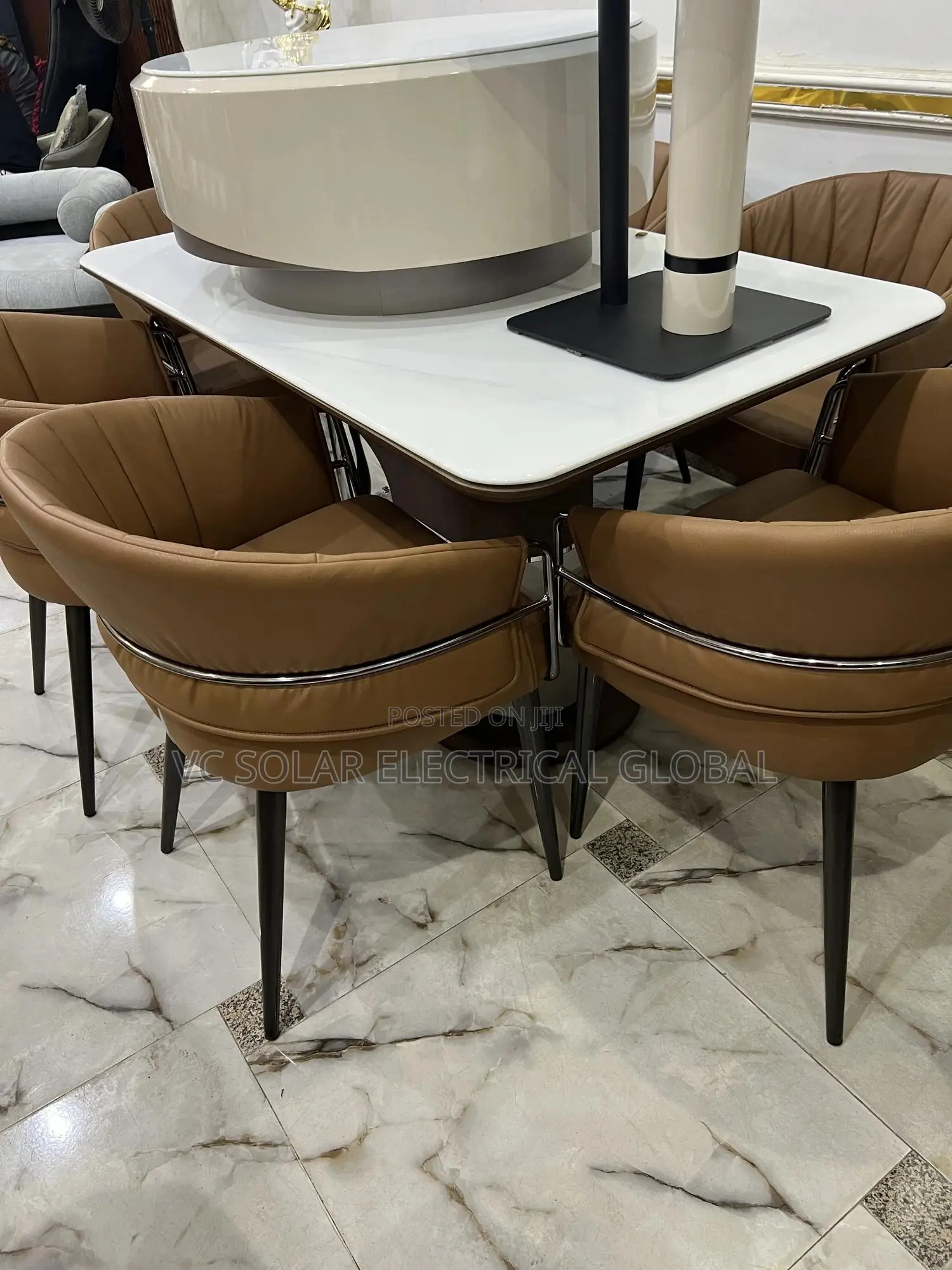 White Marble Dining Set With Brown Leather Chairs .