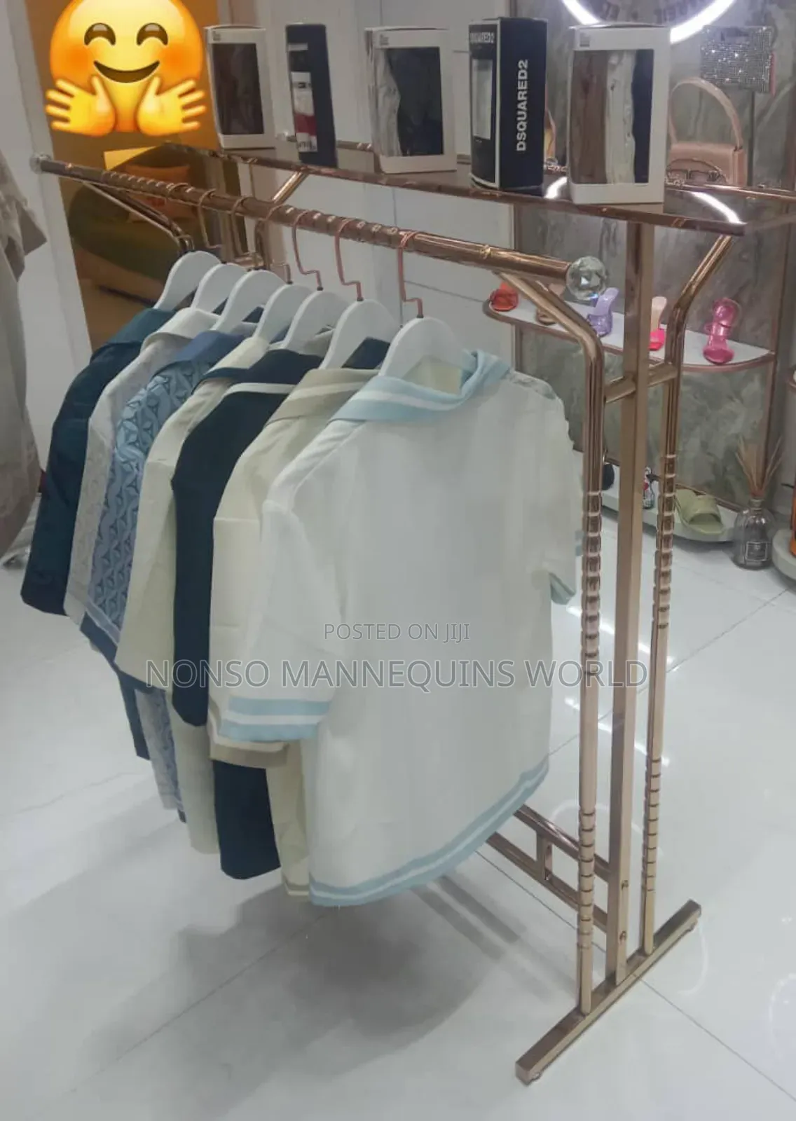 Double Sided Rose Gold Cloth Rack Display Stand