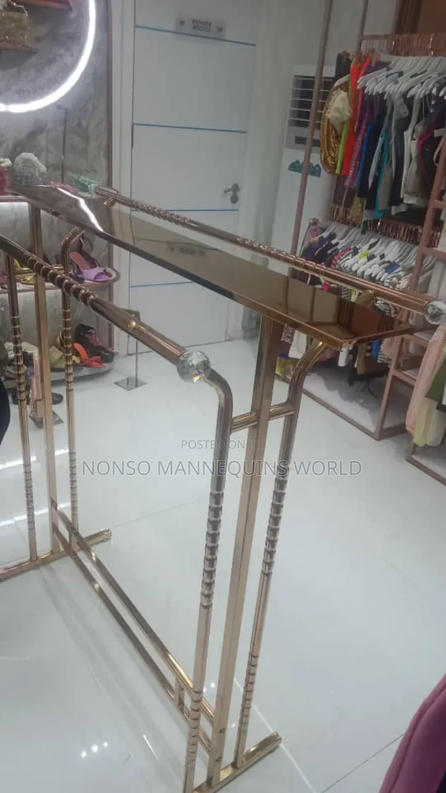Double Sided Rose Gold Cloth Rack Display Stand