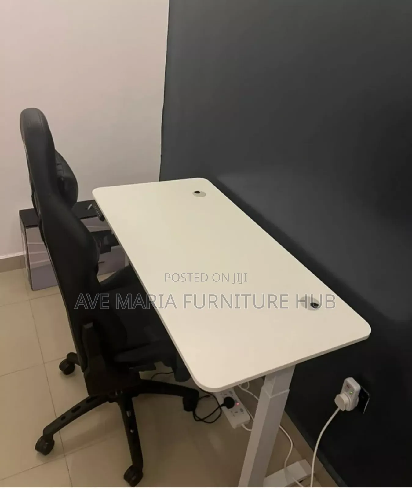 Electric Height Adjustable Desk and Gaming Chair.