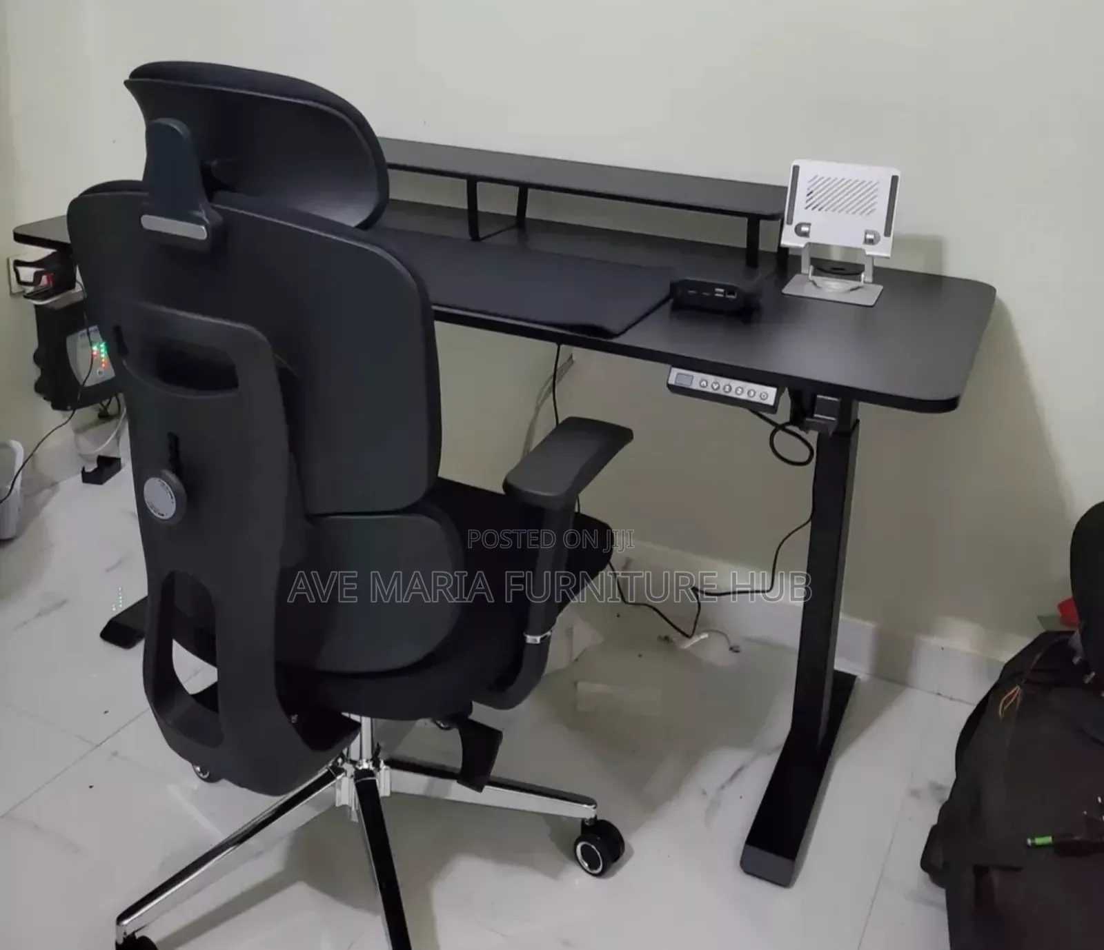Sit-Stand Adjustable Gaming Desk and Chair.