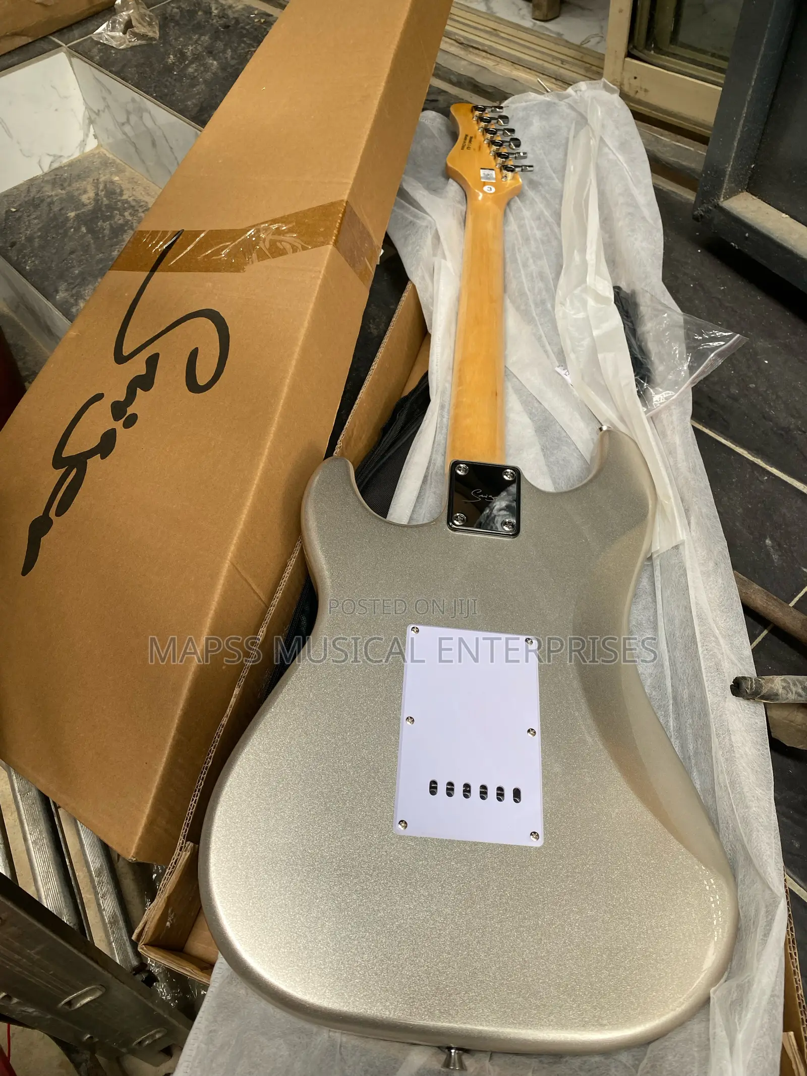 Smiger Lg-2 Stratocaster Electric Guitar in the Chrome Glow Finish.