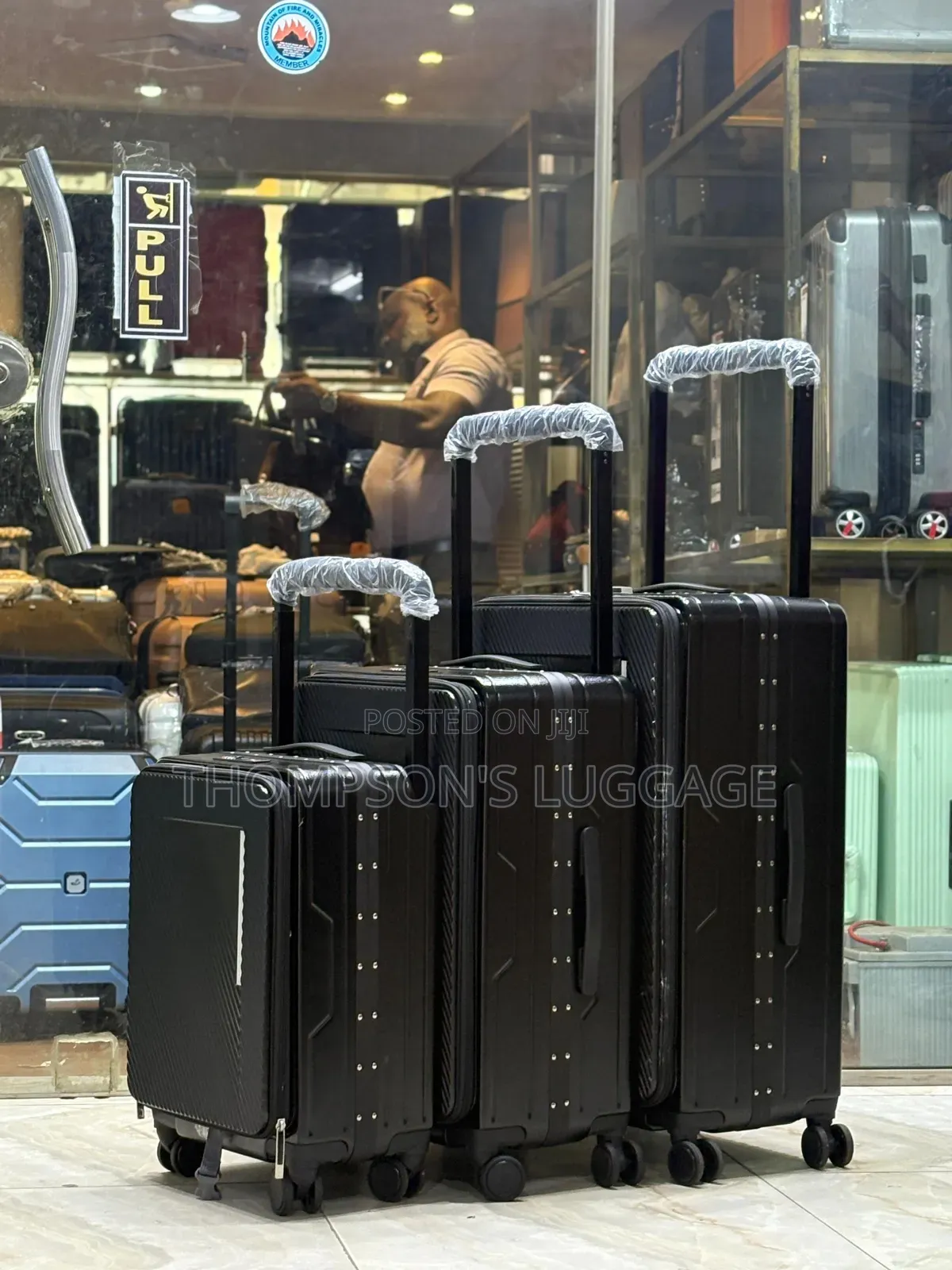 Black Wide Poll Luggage