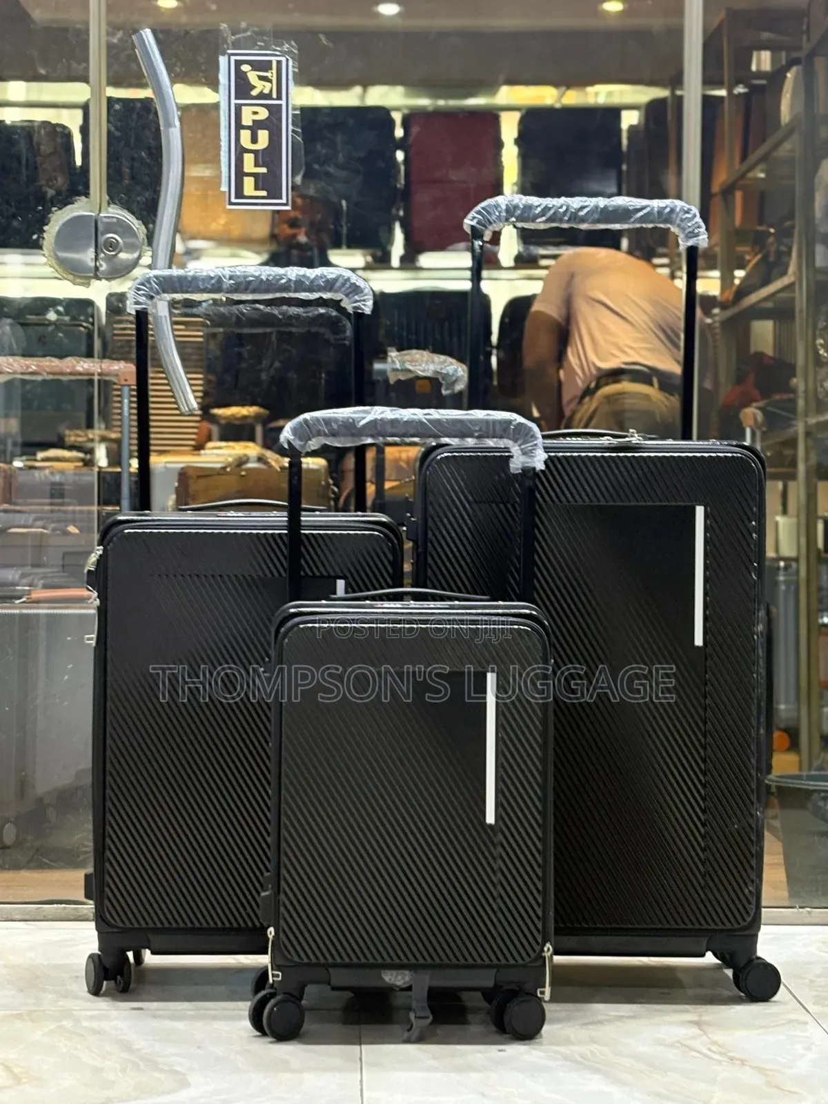 Black Wide Poll Luggage
