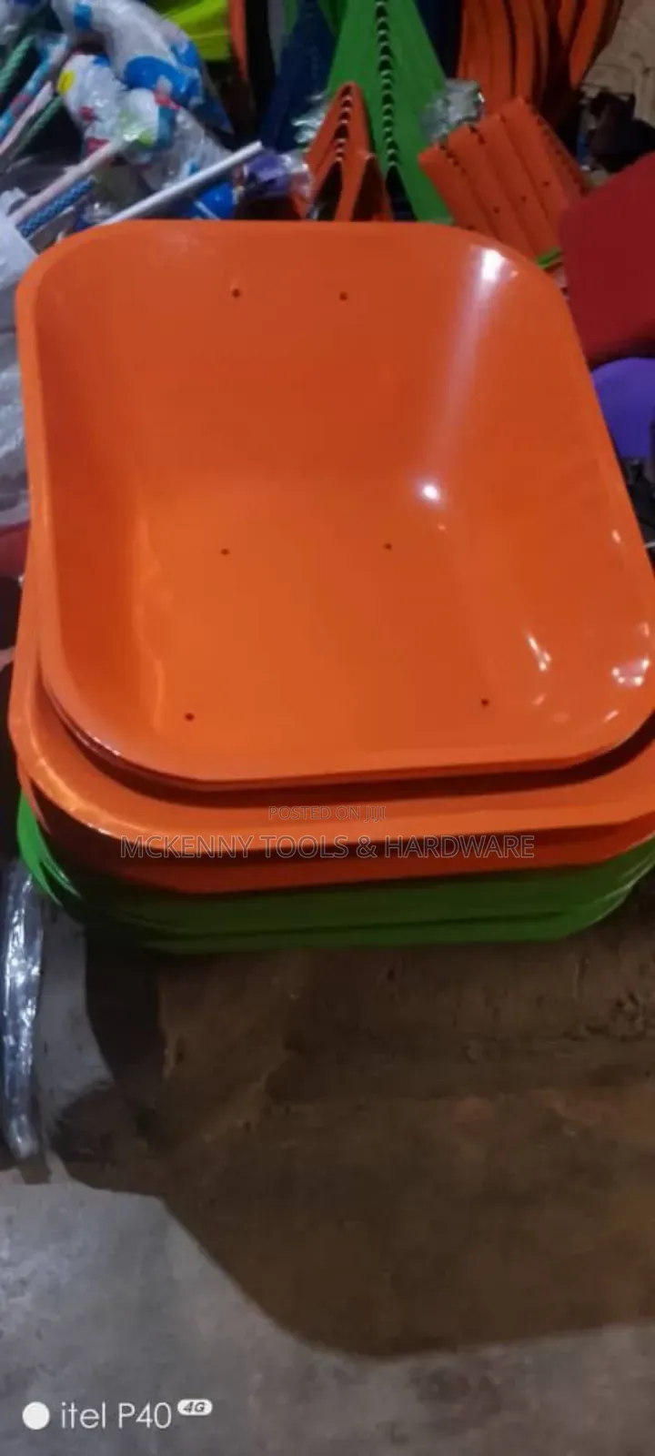 Blue Wheelbarrow, Which Is an Essential Tool for Moving Heavy Loads.