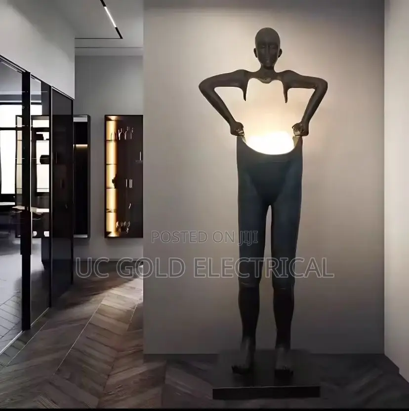 Nordic Humanoid Sculpture Floor Lamp Long Arm Holding Ball Creative
