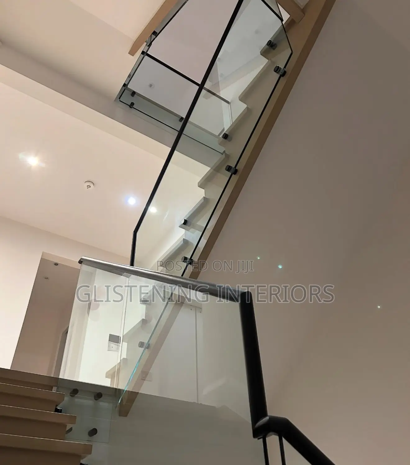Staircase 10mm Plain Tempered Glass With A Black Profile And Stud