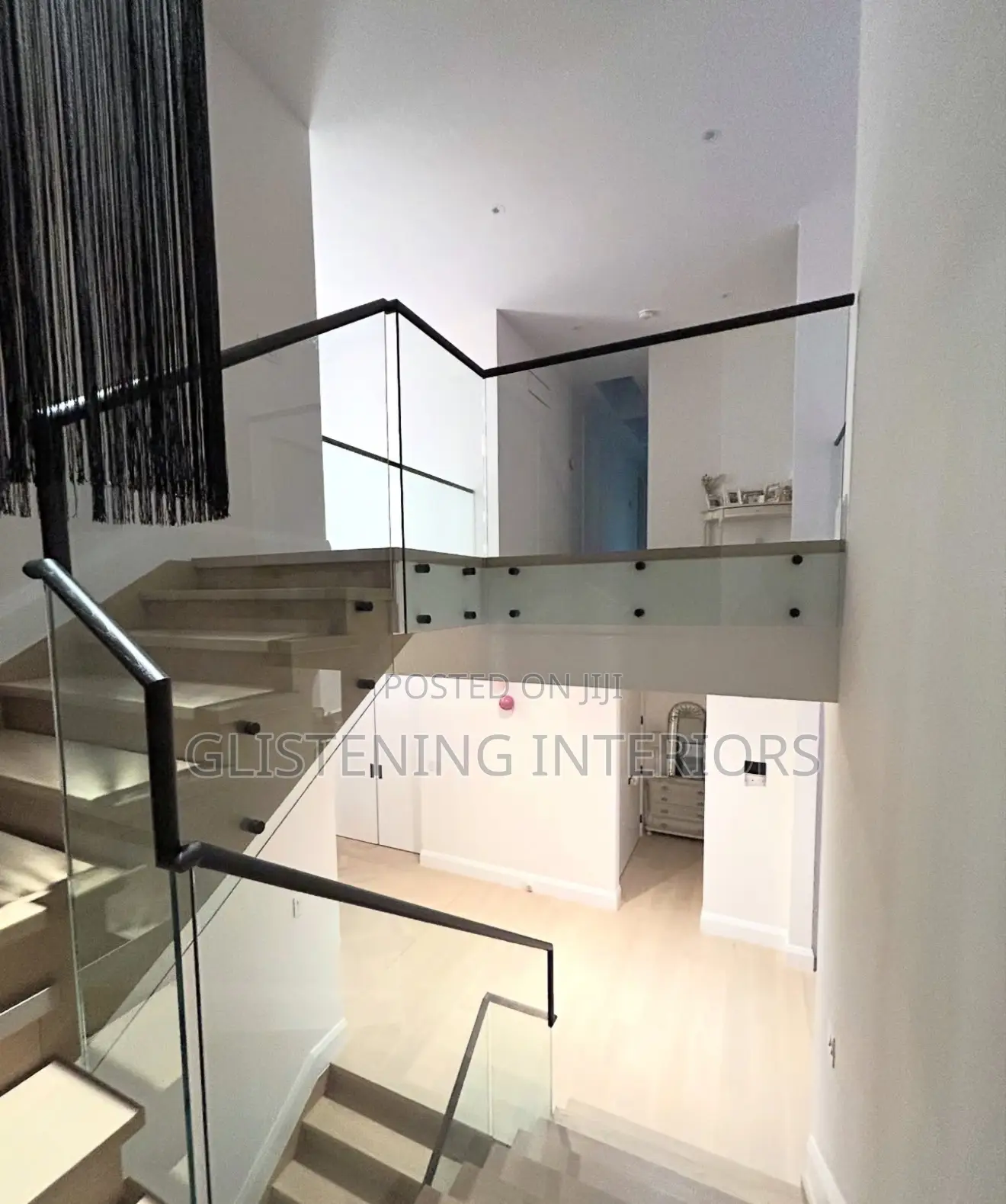 Staircase 10mm Plain Tempered Glass With A Black Profile And Stud