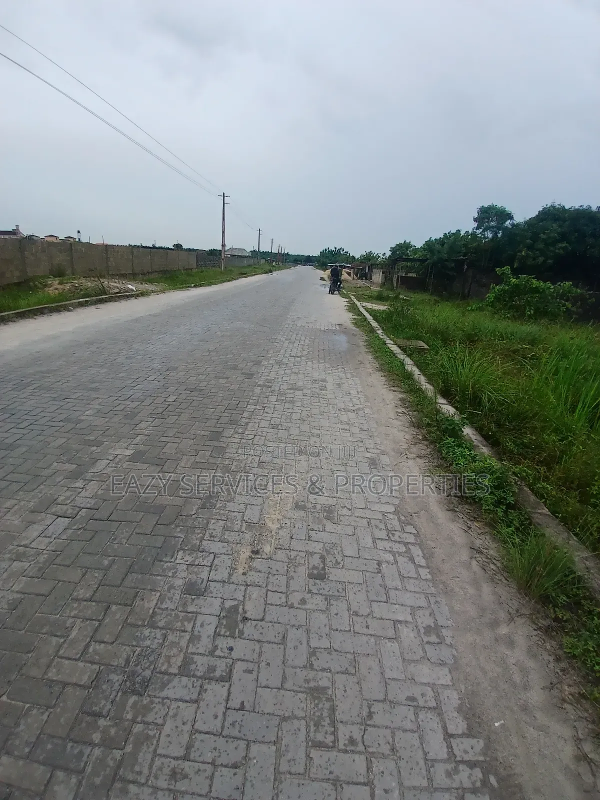 Land Measuring 1,400sqm Facing Tarred Road at Sangotedo