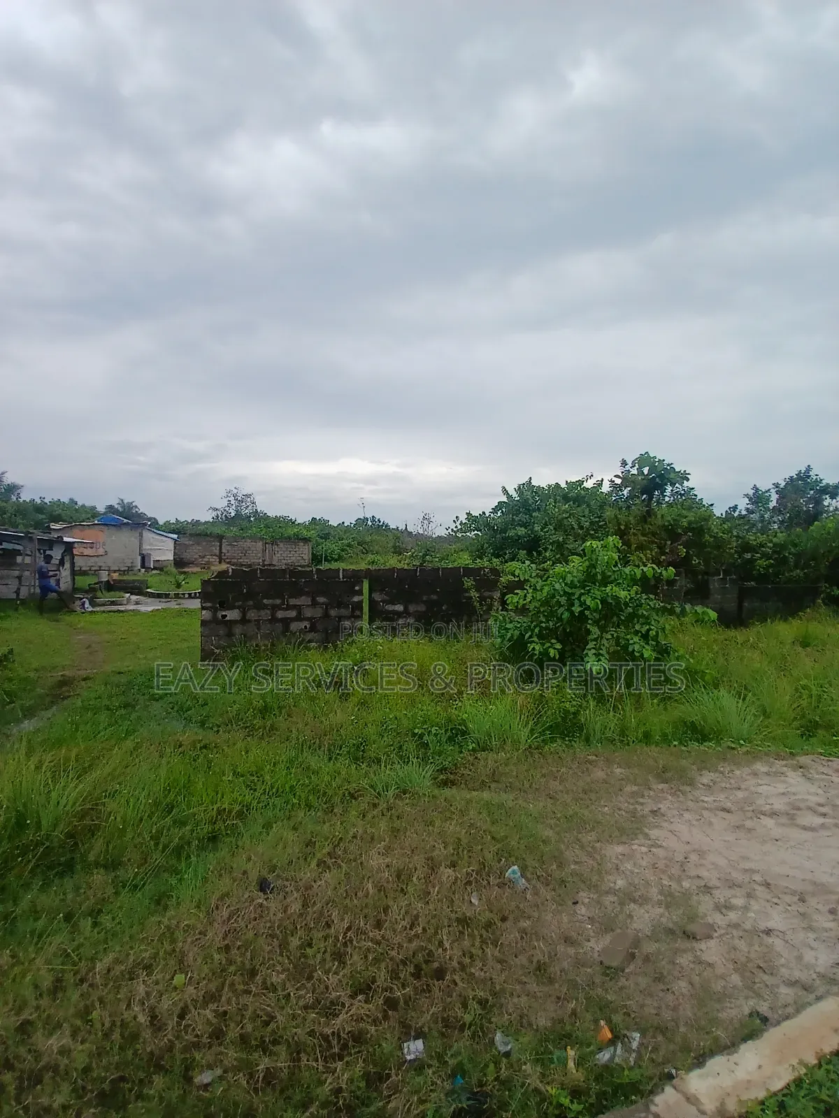 Land Measuring 1,400sqm Facing Tarred Road at Sangotedo