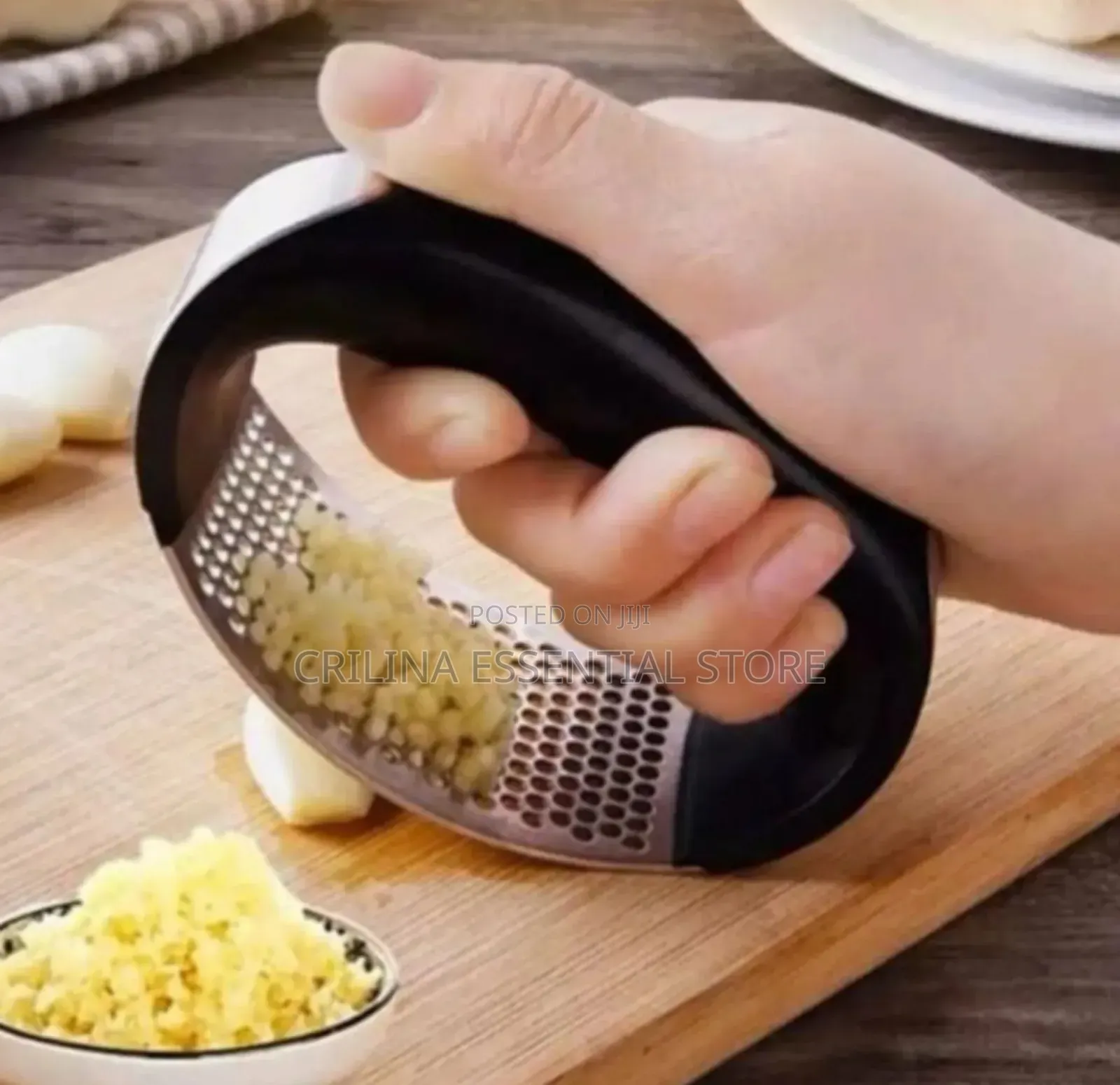 Stainless Steel Manual Garlic Press With Ergonomic Black Handle