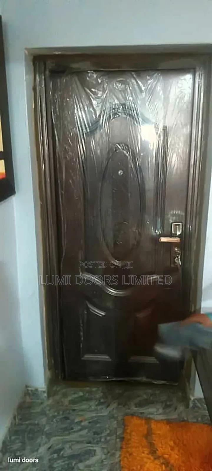 Brown Steel Door With Peephole