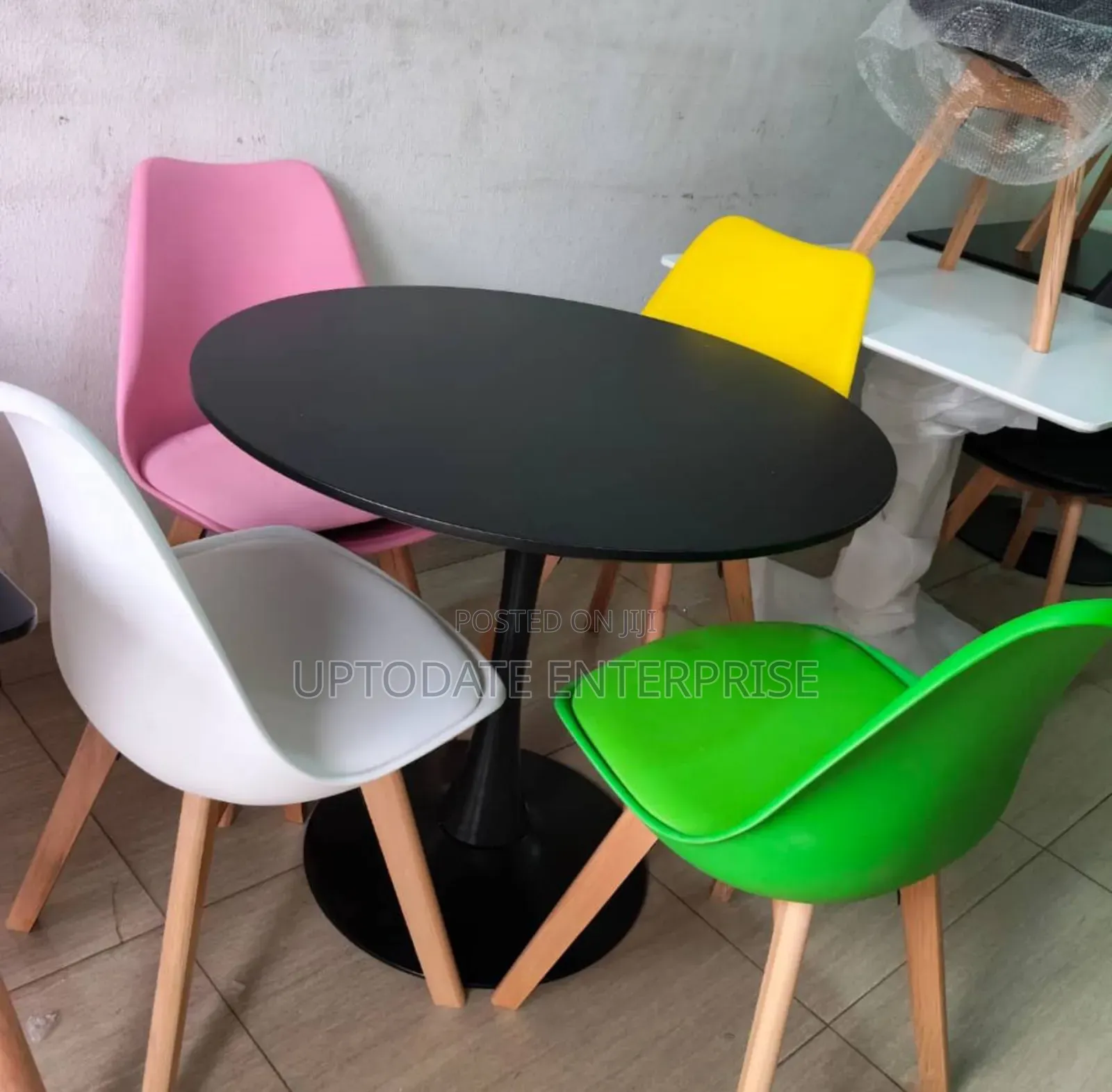 Restaurant Table With Colourful Chairs