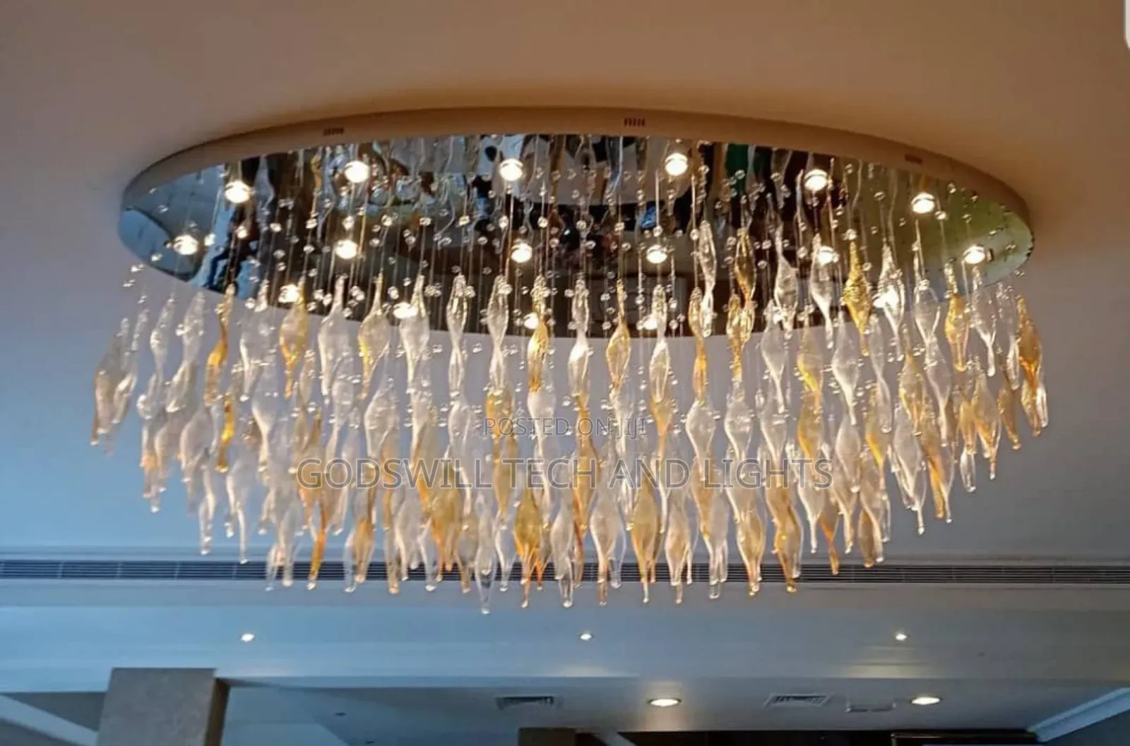 A Gold-Tone or Mirrored Base and Led Lights.