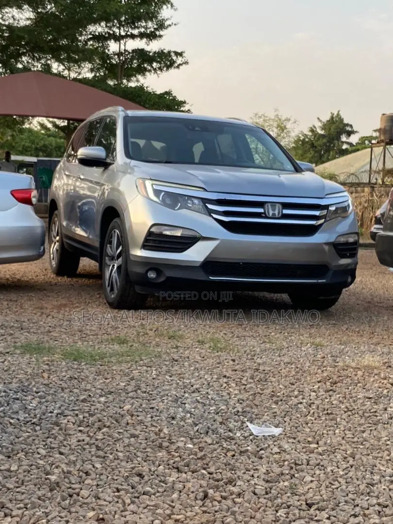 Honda Pilot Touring 4dr SUV 4WD (3.5L 6cyl 9A) 2017 Silver