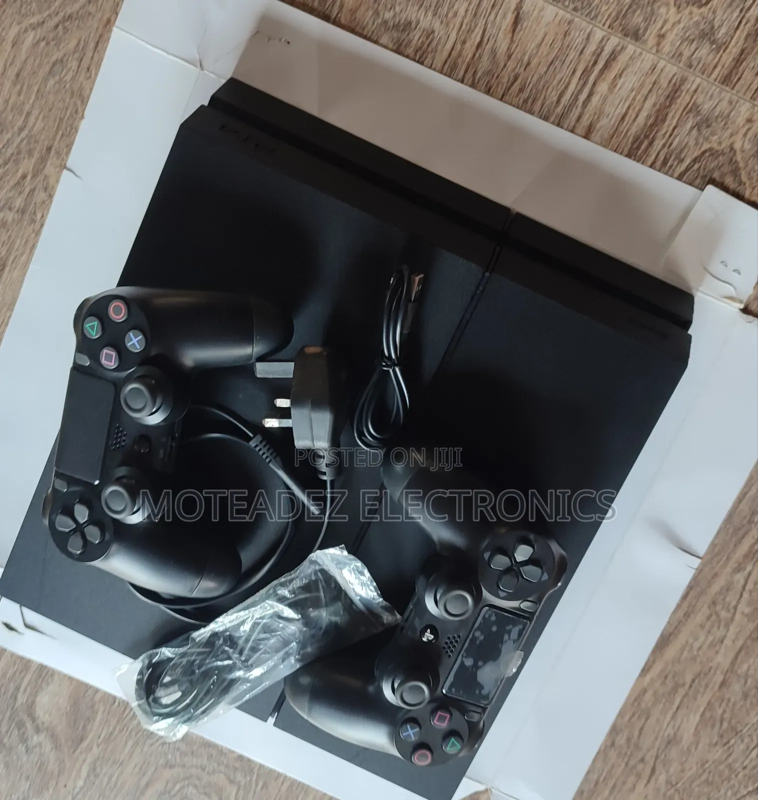 Uk Used Sony Ps4 With 2pads, Fifa'25 Games Downloaded and Cables