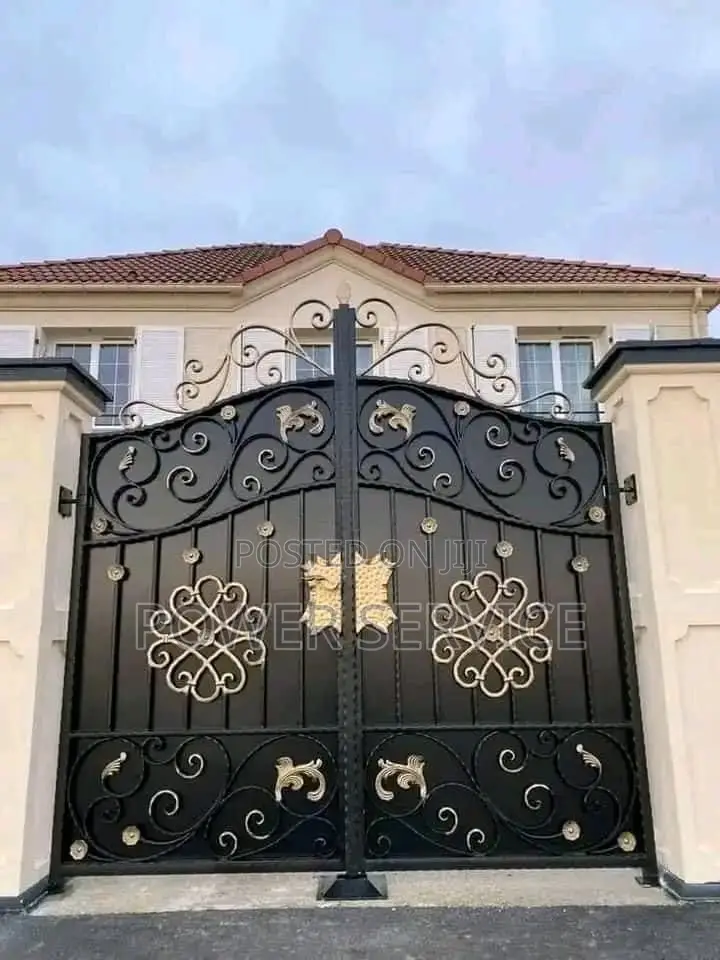 Ornate Black and Gold Wrought Iron Drive Gate