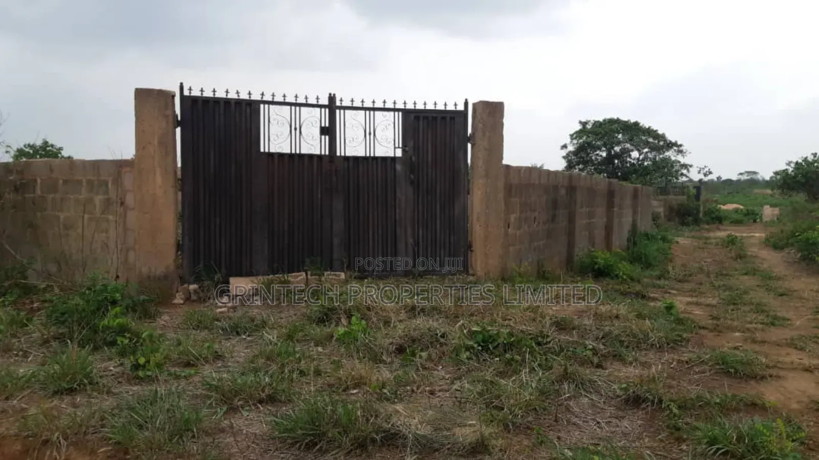 Fenced and Gated Plot of Land for Sale in Ogijo