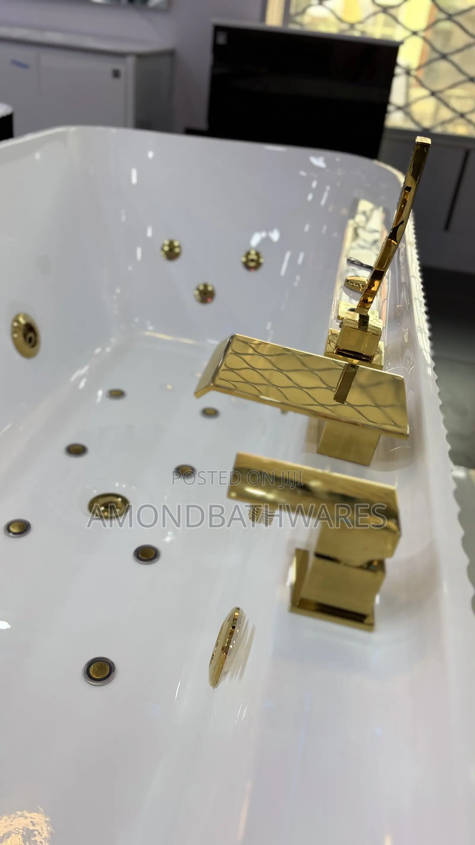 Black White Jacuzzi With Gold Fittings