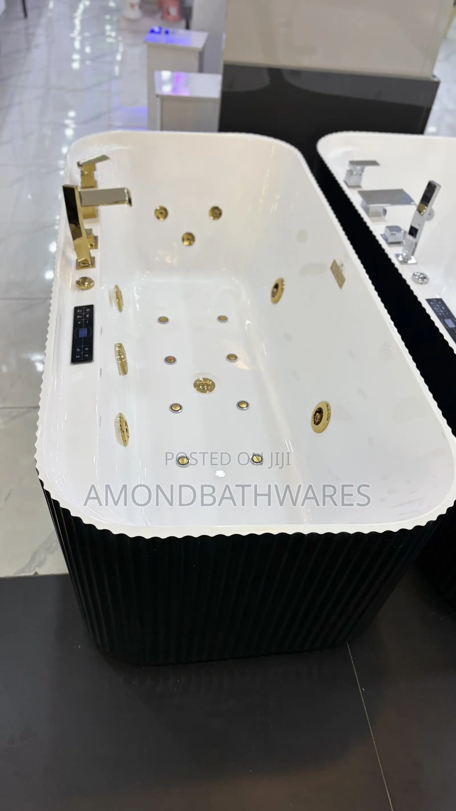 Black White Jacuzzi With Gold Fittings