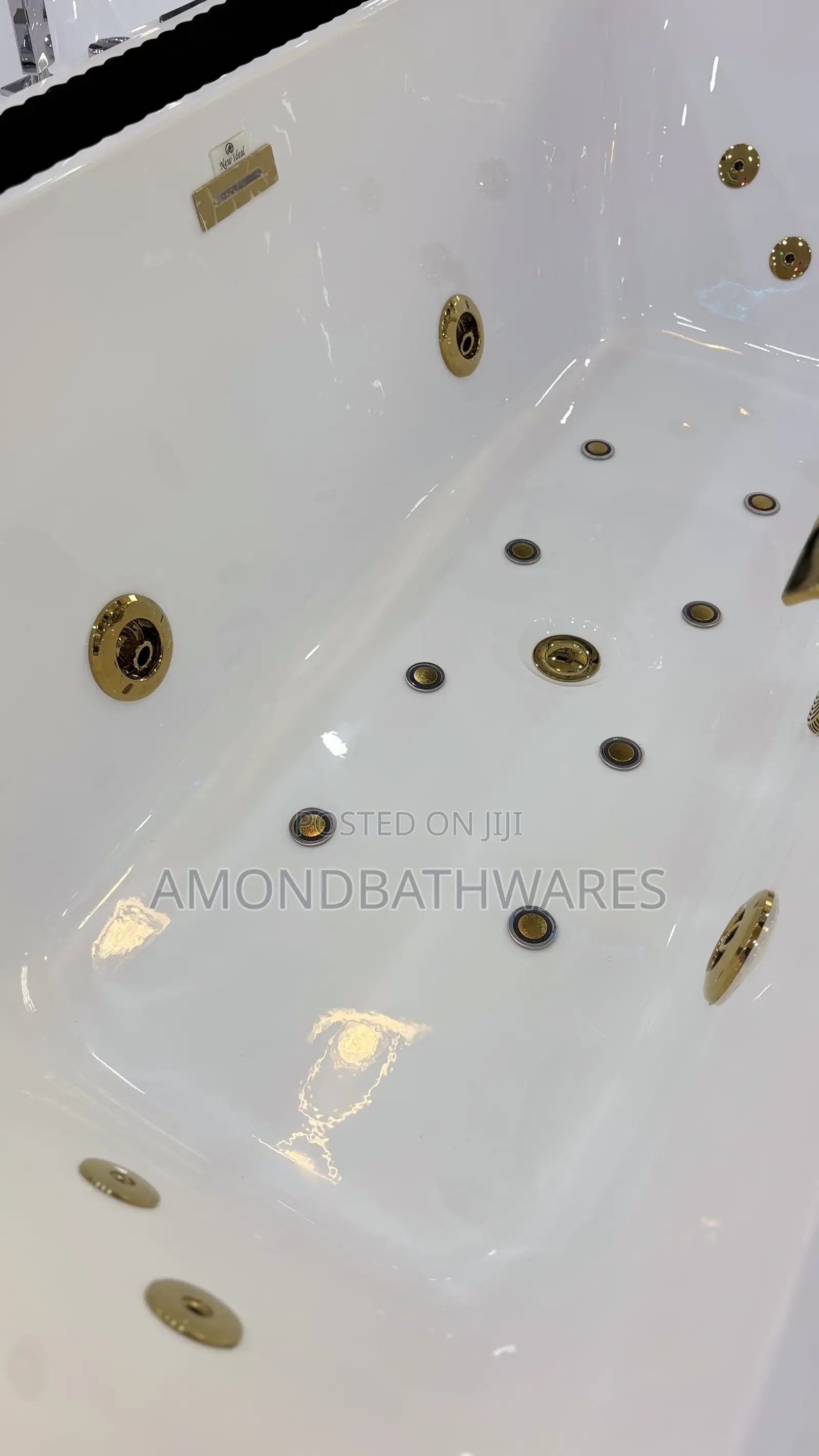 Black White Jacuzzi With Gold Fittings