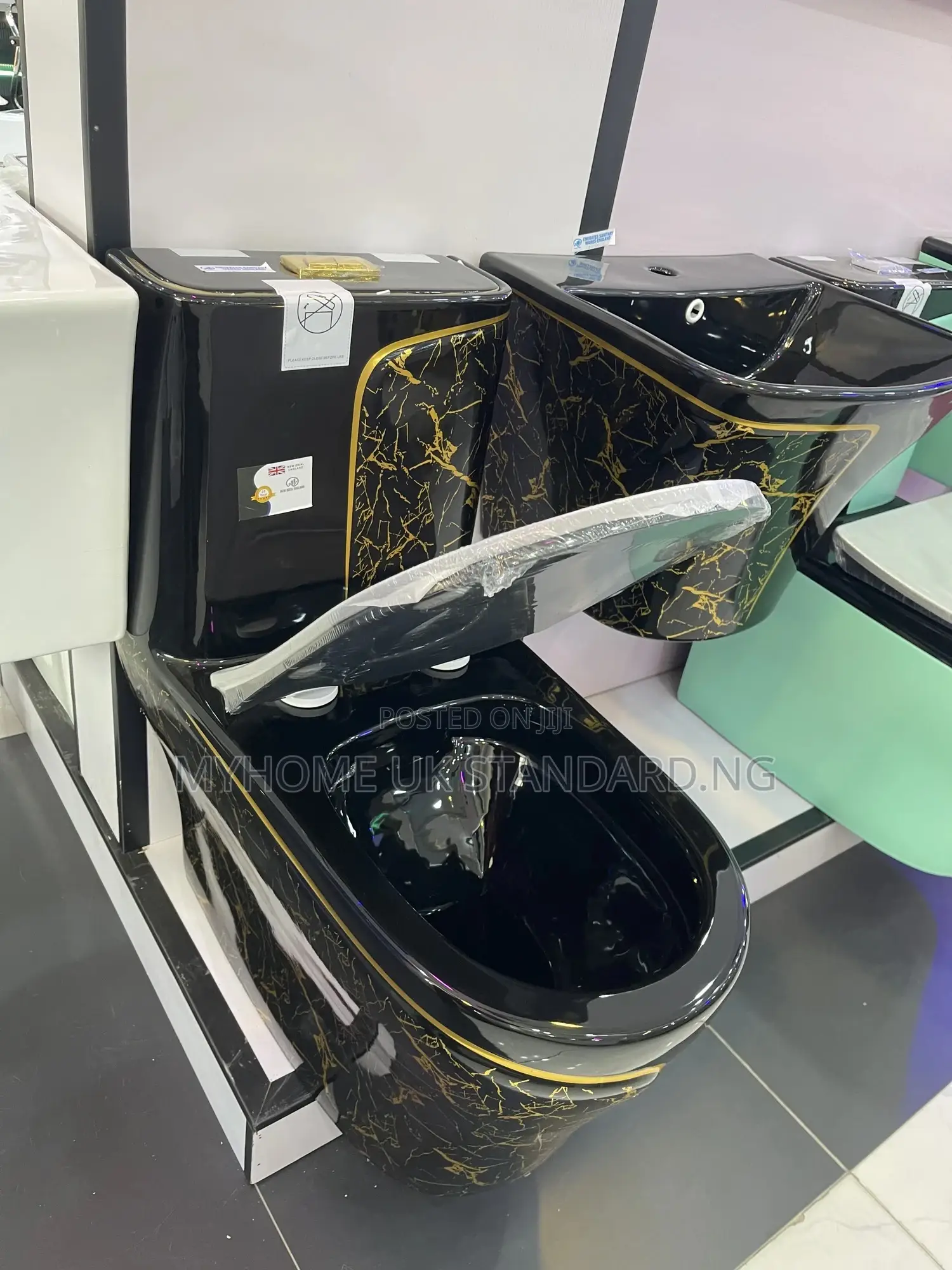 Black And Gold Water Closets With Hanging Basin
