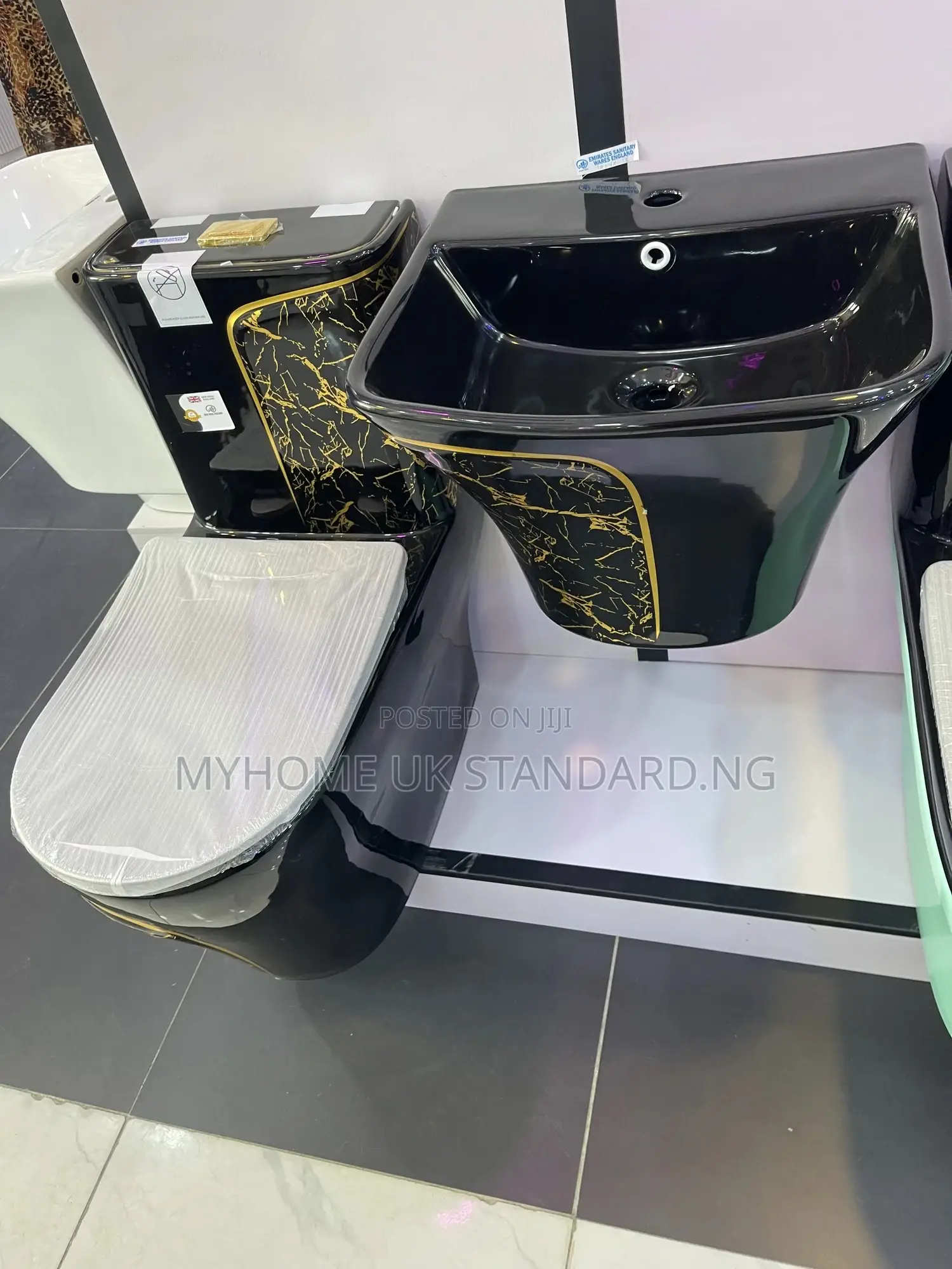 Black And Gold Water Closets With Hanging Basin