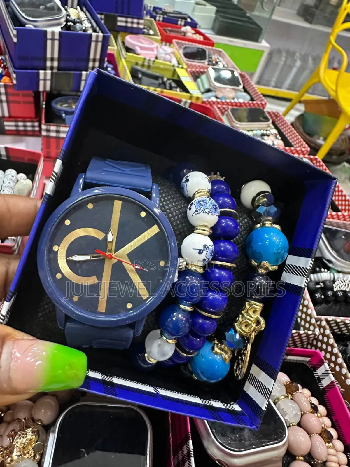 Ck Wristwatch and Bead Bangle With Box