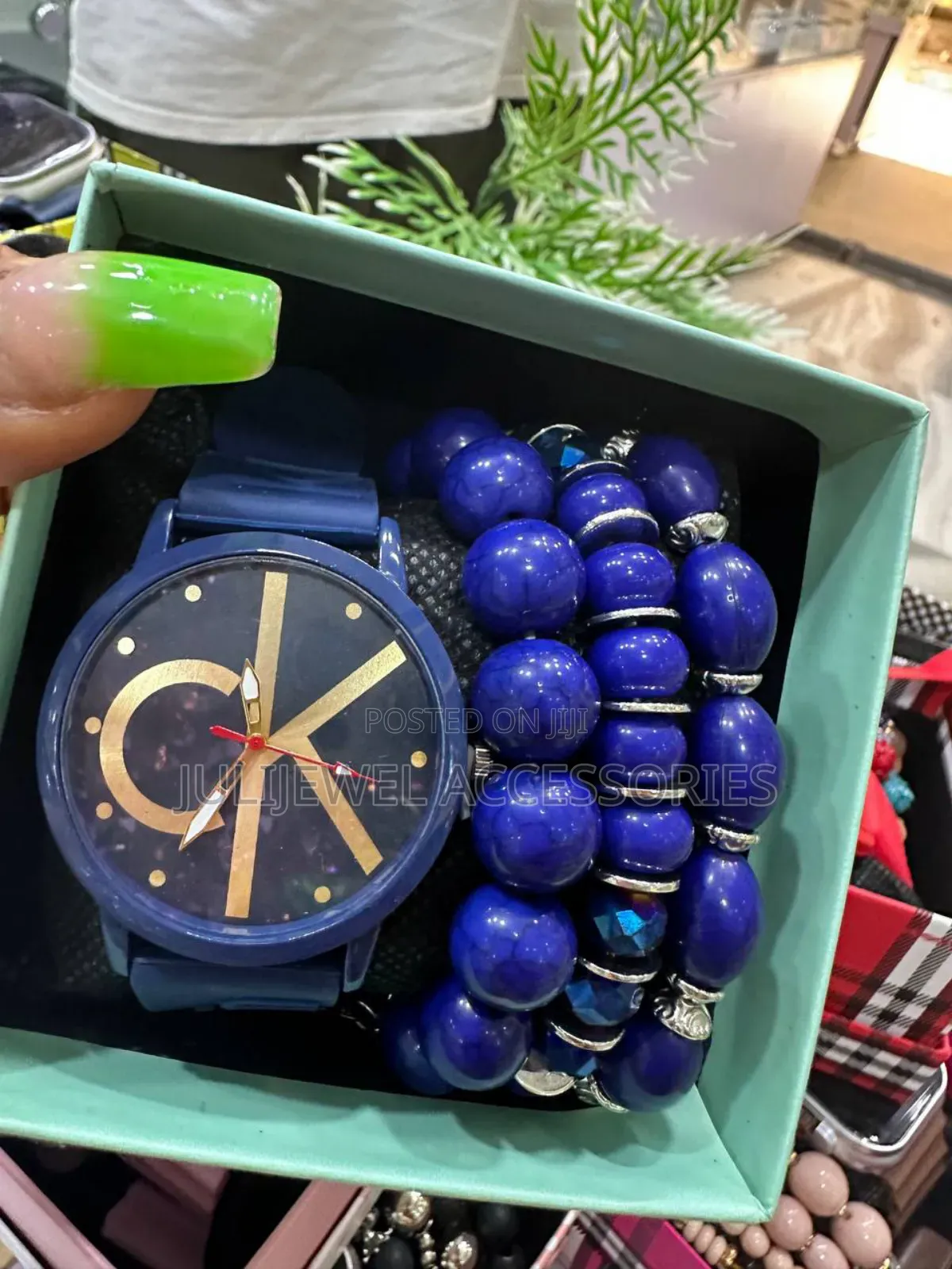 Ck Wristwatch and Bead Bangle With Box