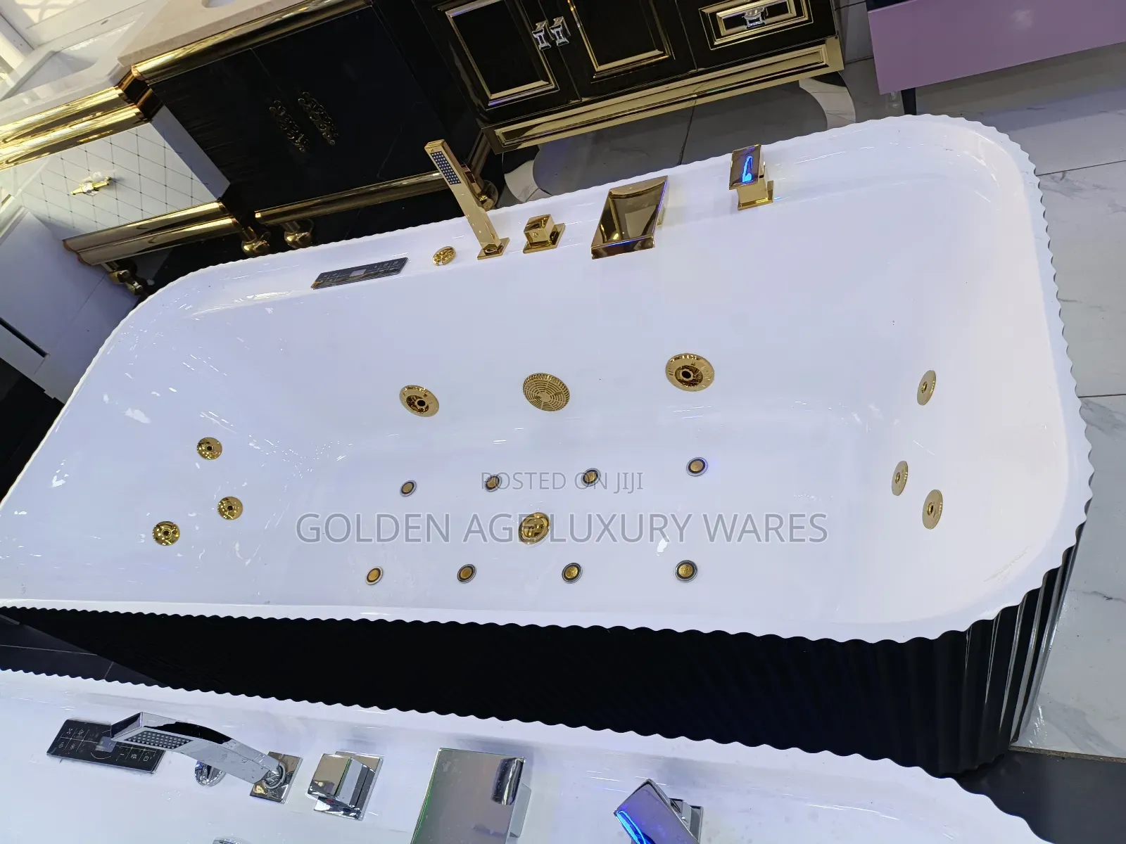 Luxury White and Black Jacuzzi With Gold Faucets