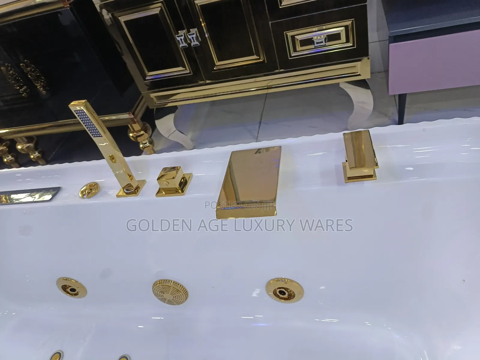 Luxury White and Black Jacuzzi With Gold Faucets
