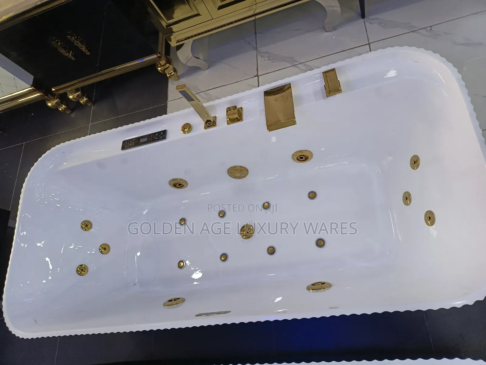 Luxury White and Black Jacuzzi With Gold Faucets