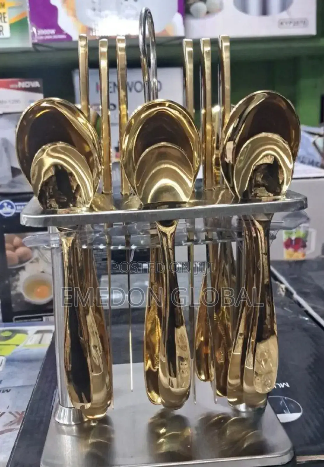 A Set of Gold-Finished Stainless Steel Cutlery.