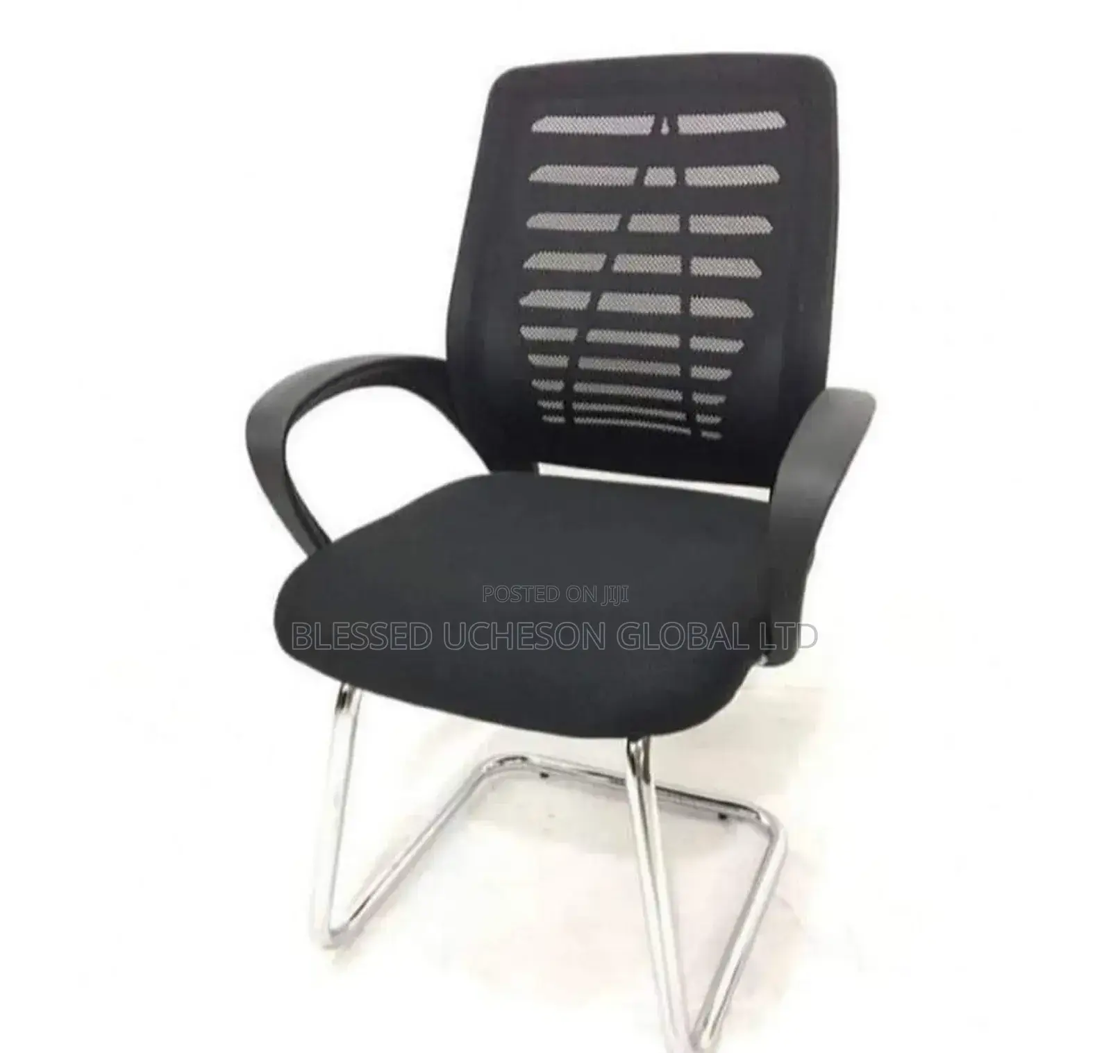 Black Mesh Office Visitor Chair With Sled Base and Armrests.
