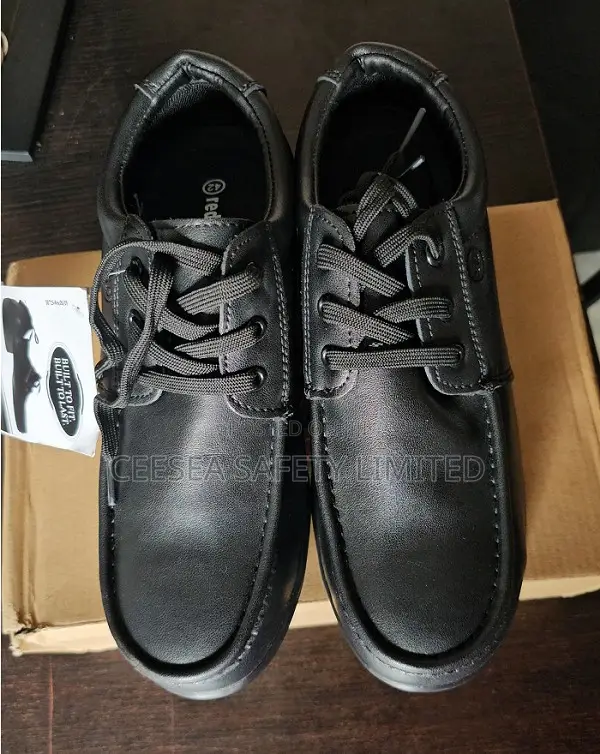 Red Wing Safety Shoe - China 42
