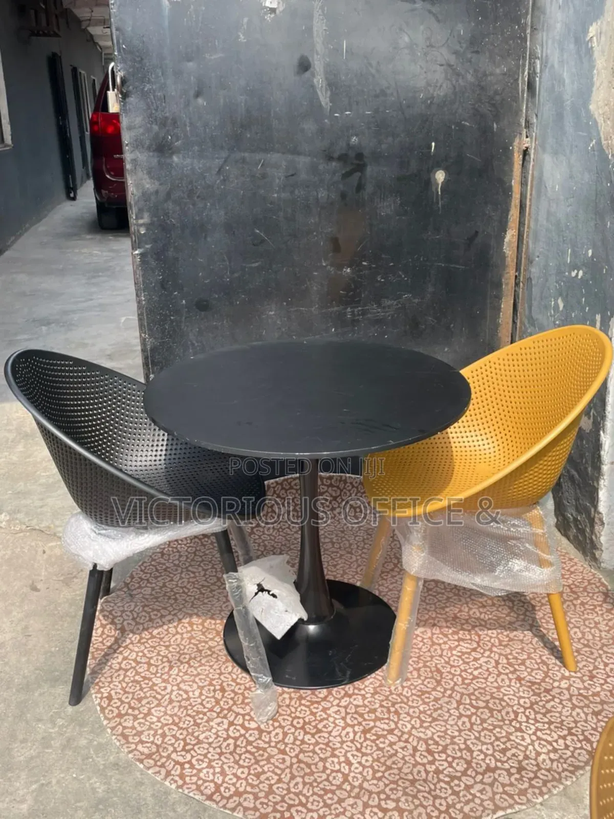 Modern Tulip Table 2 Perforated Chairs