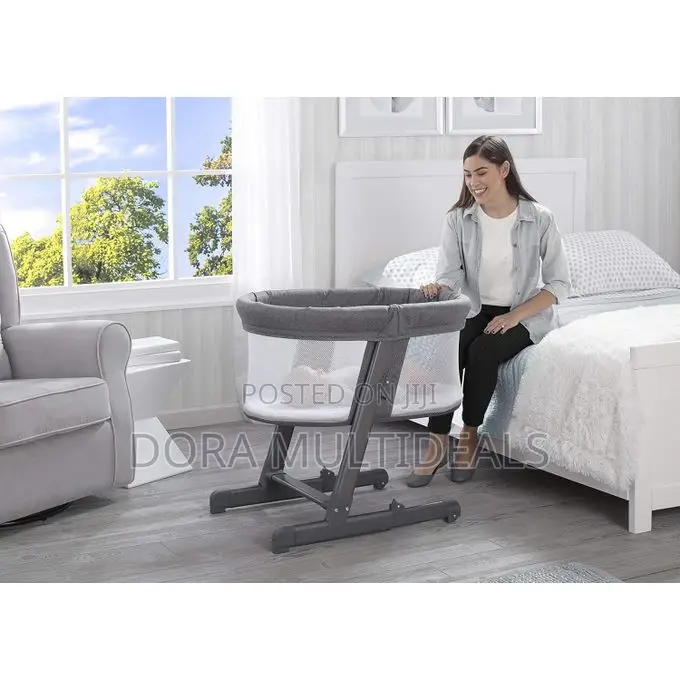 Delta Children Oval City Sleeper Bedside Bassinet Adjustable Height