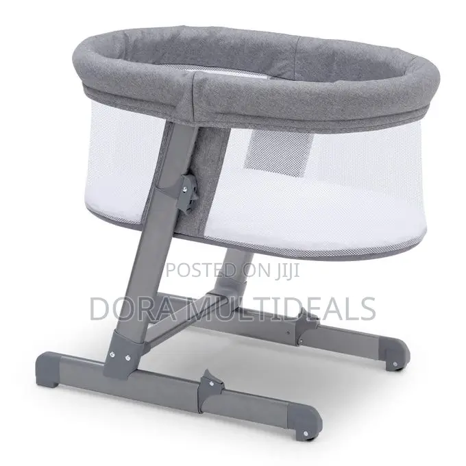 Delta Children Oval City Sleeper Bedside Bassinet Adjustable Height