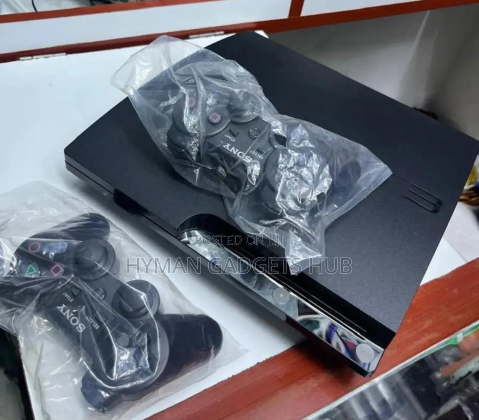 Sony Playstation 3 Slim With 2 Pads and 10 Games and Accessories