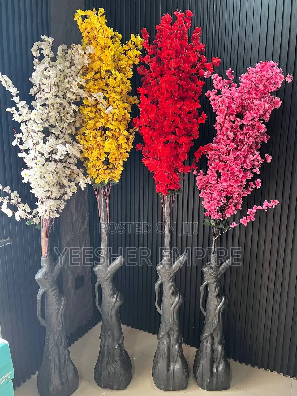 Colorful Blossom Flower in Plastic Stand