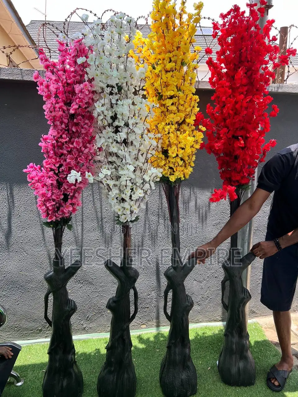 Colorful Blossom Flower in Plastic Stand